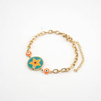 Pulsera dorada con dije de estrella con una zirconia 