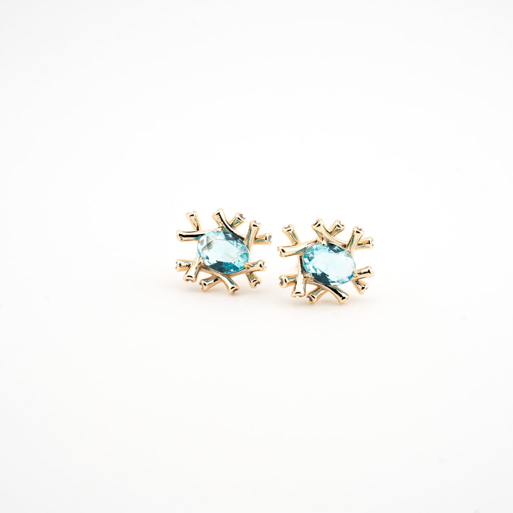 Aretes dorados con cristal azul