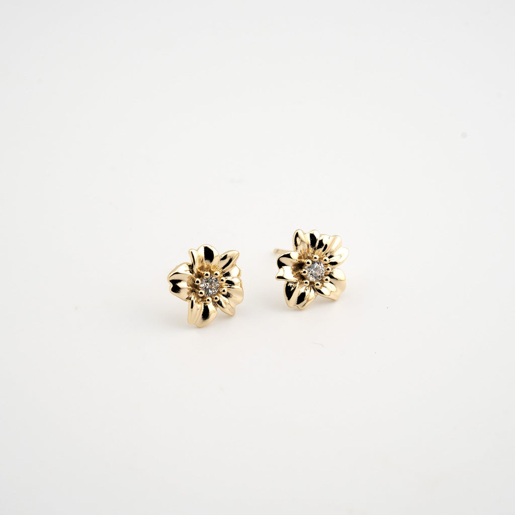 Arete en forma de flor con zirconias al centro