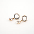 Arete con zirconias y un colgante de cristal