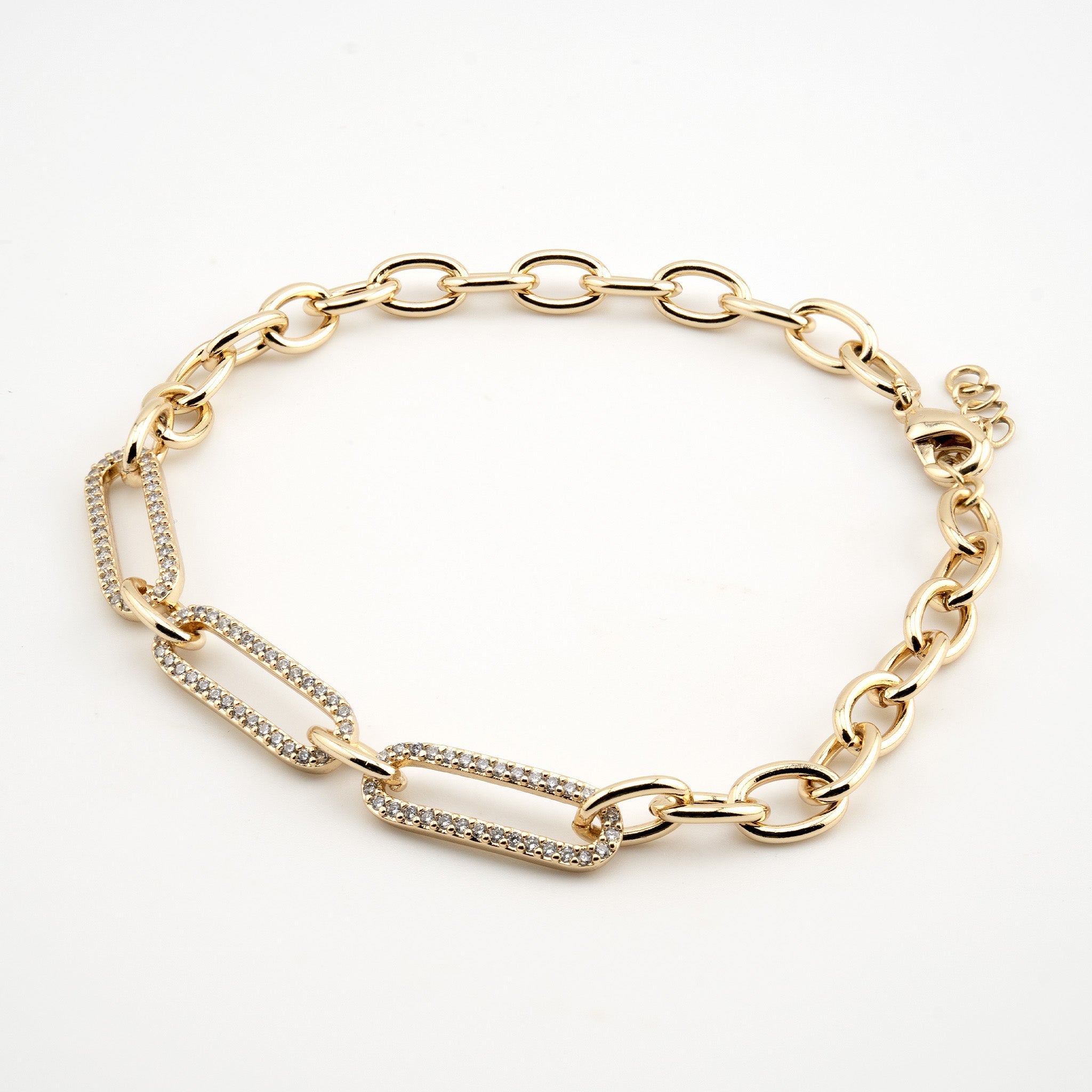 Pulsera dorada con cadenas con zirconias