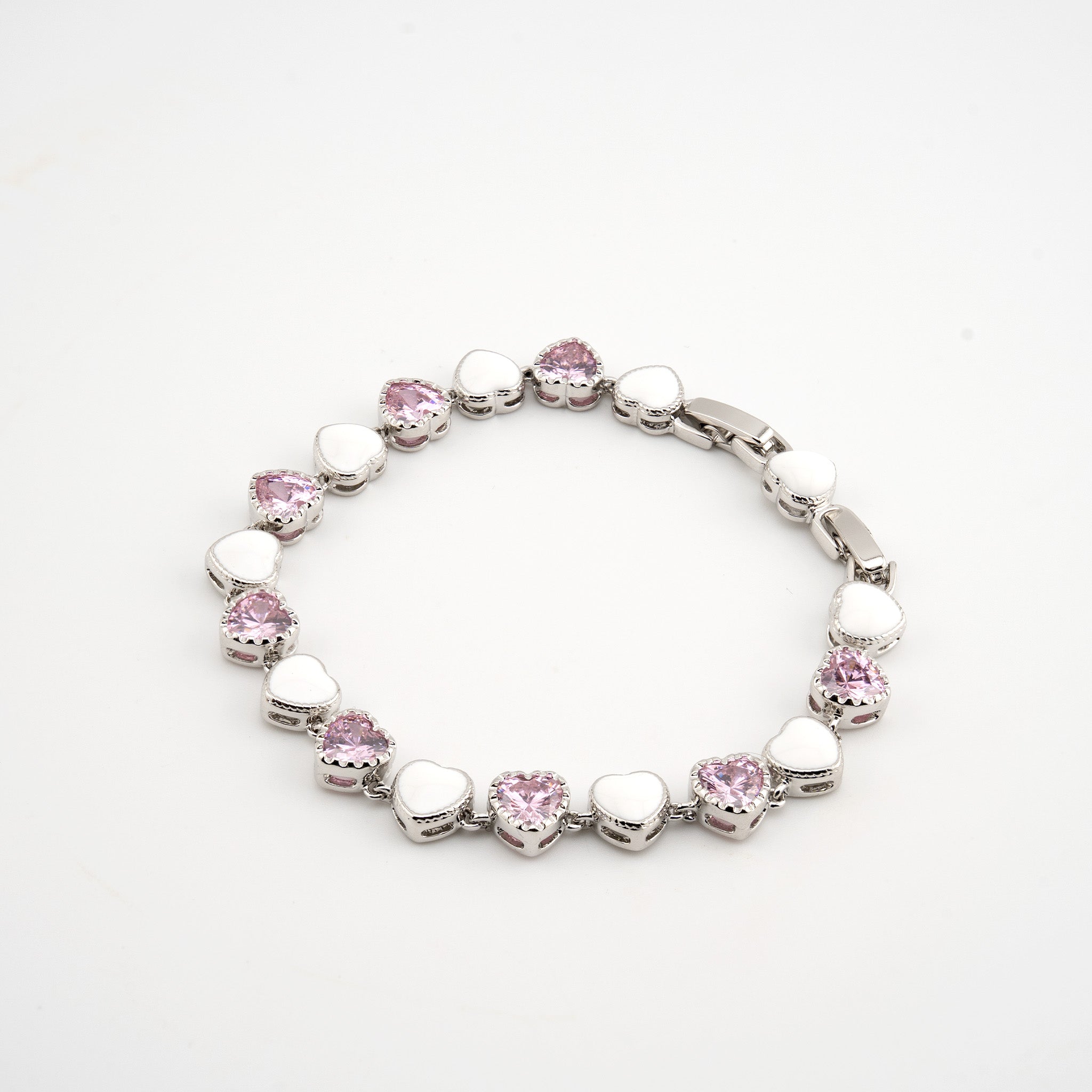 Esclava plateada con corazones con cristal rosa 