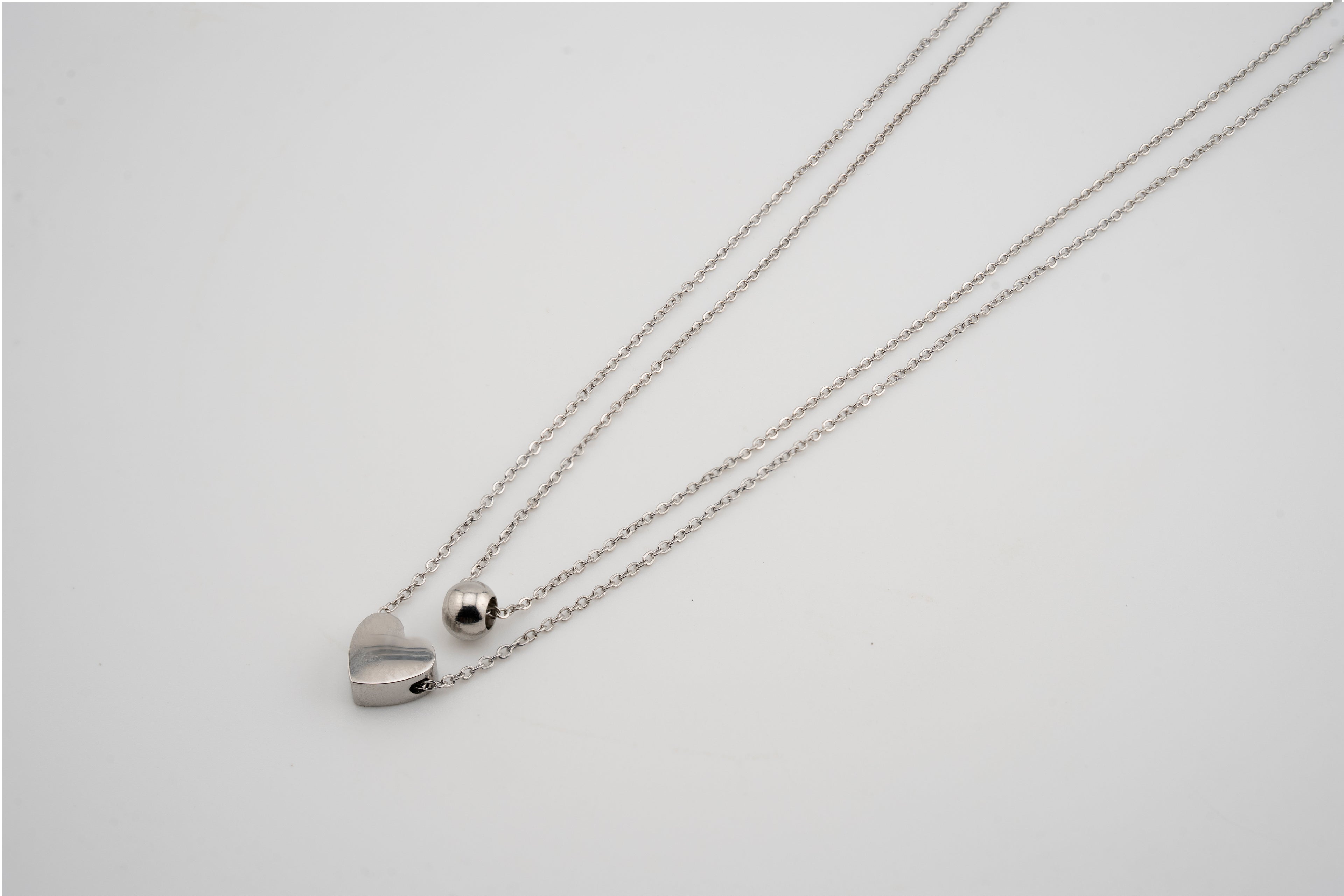 Collar doble con dije de corazón